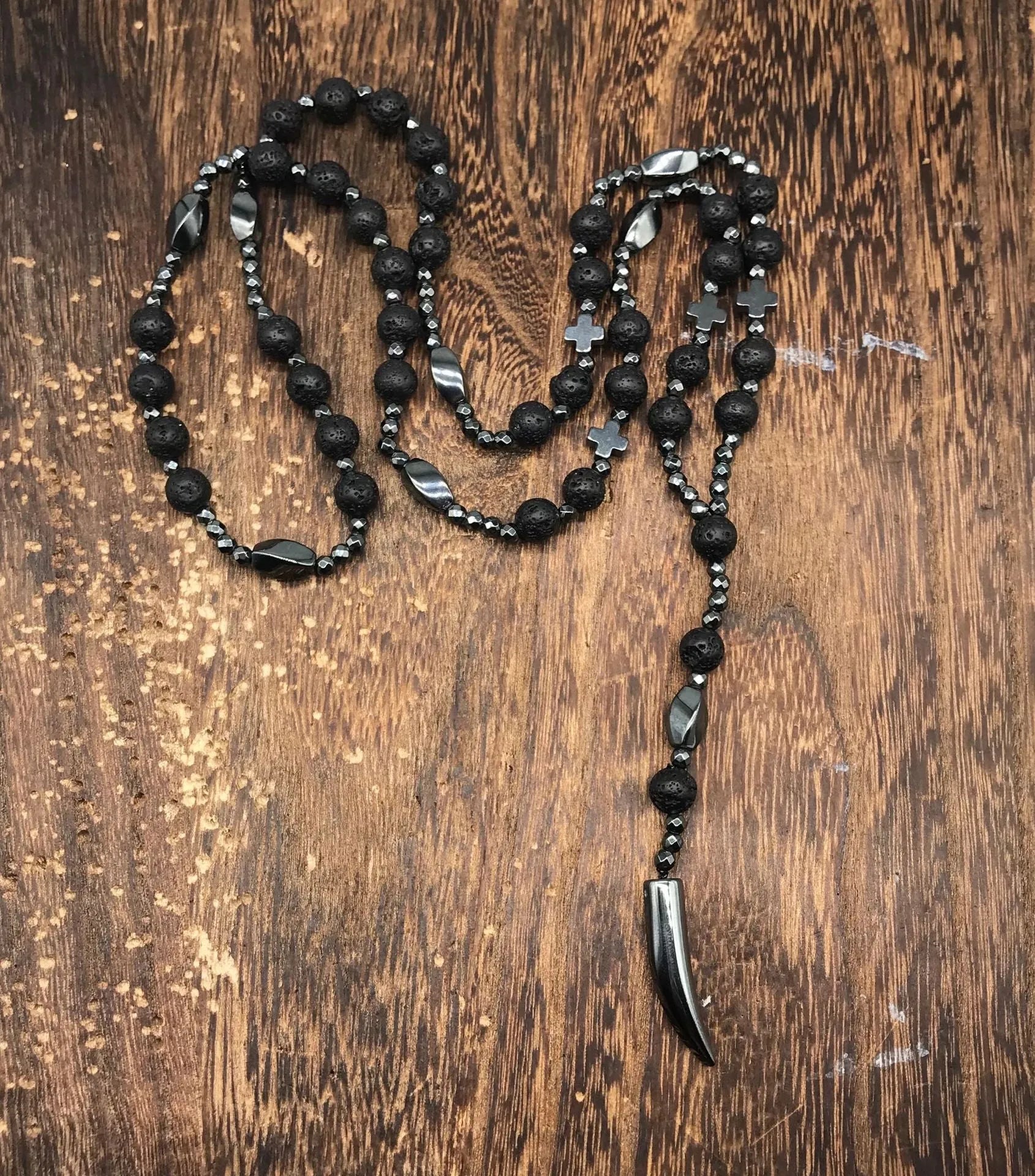 Men's stone geometric cross pendant on an 80cm ball bead chain with safety lock.