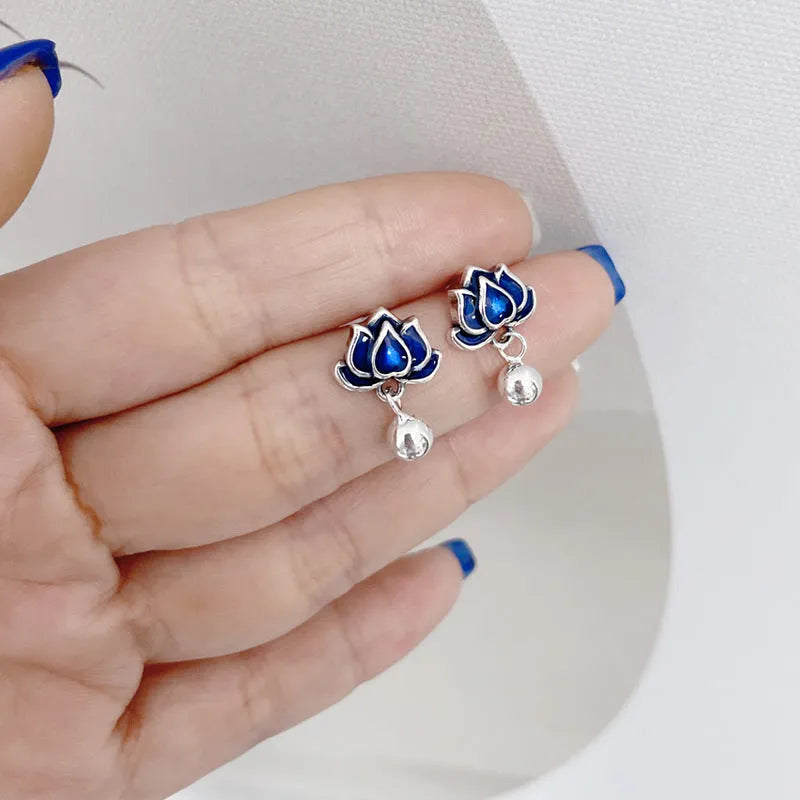 Blue Lotus alloy stud earrings with detailed lotus seedpod tassel and flower design