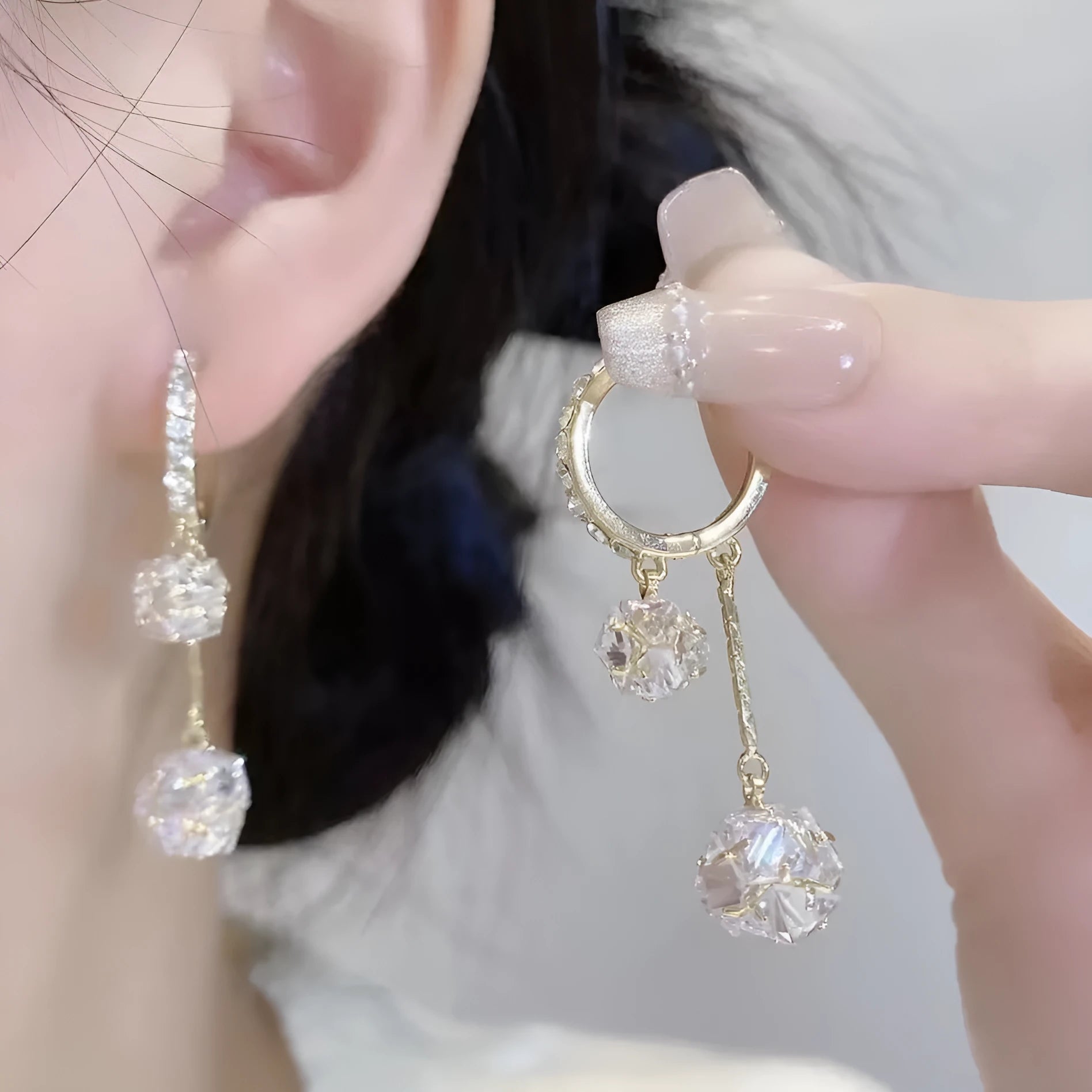 Silver women's earrings with tassel ball and rhinestone confession balloon pendant drop design