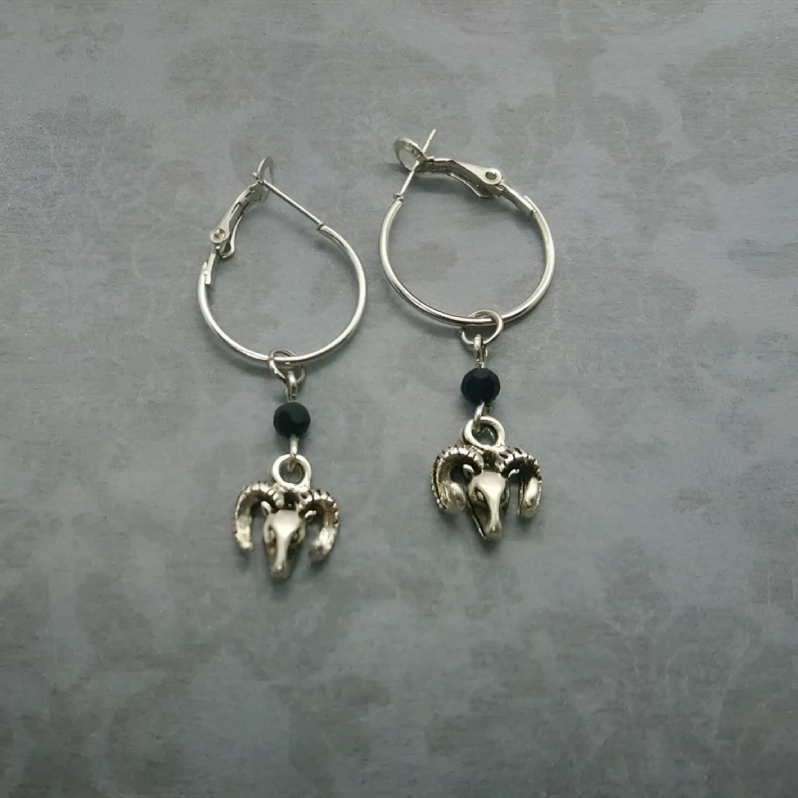 Silver Tibetan antelope inspired round ring earrings for women