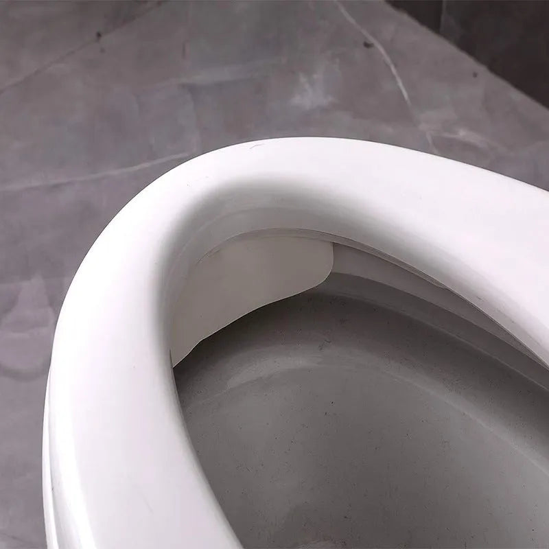 White PVC toilet training splash guard for children's potty training to prevent urine splashing