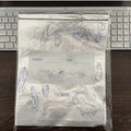 Set of aluminium foil sealed bags and boxes for food preservation in three different sizes.