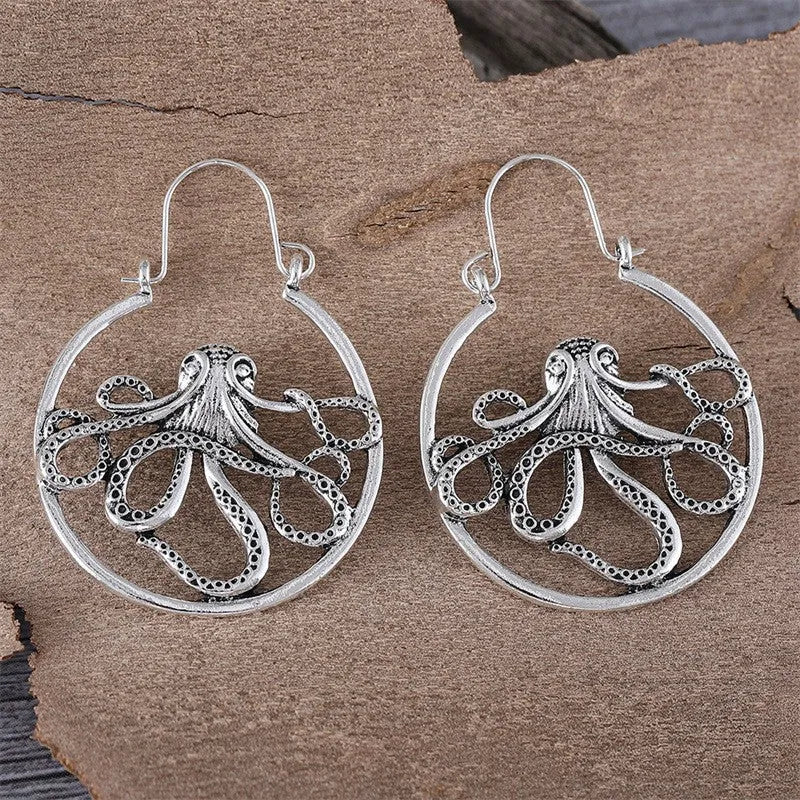 Vintage style octopus drop earrings in antique silver colour with detailed tentacle design