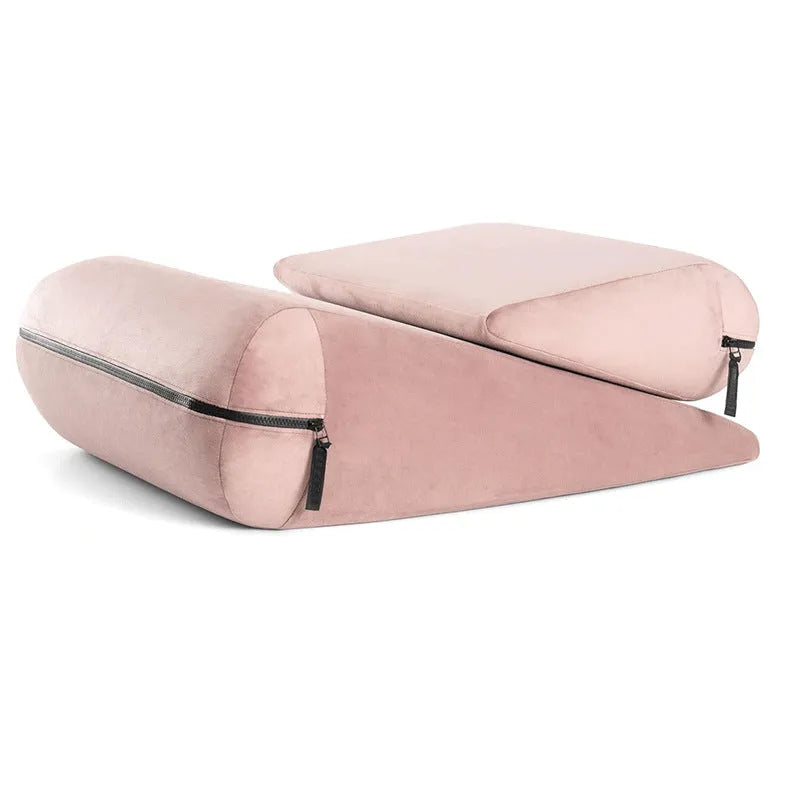 High density sponge triangle wedge pillow with embroidery detail in choice of five colours.