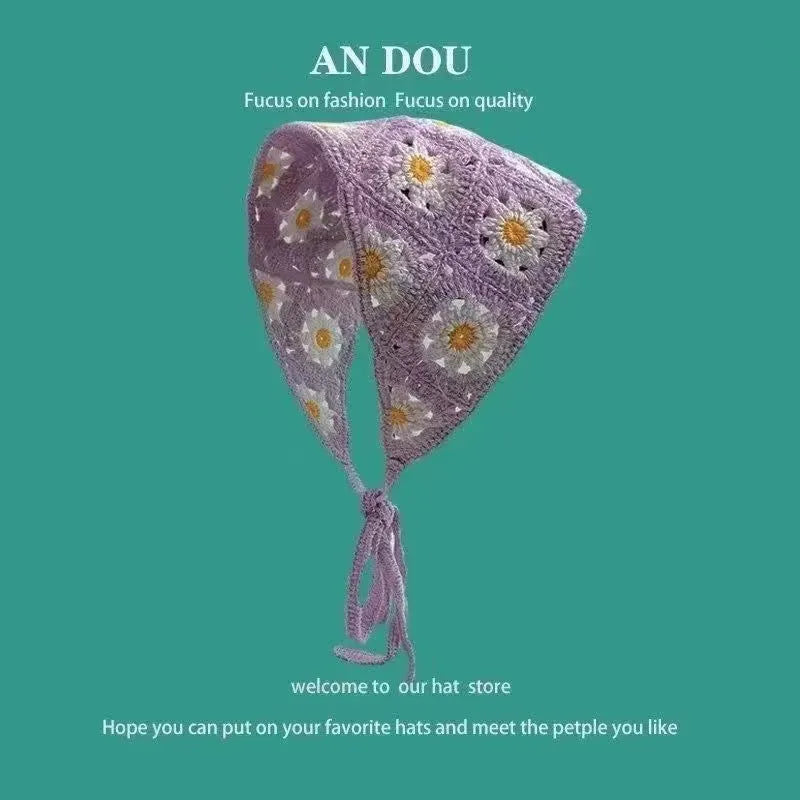 Women's cotton triangular headscarf with floral pattern, shown in beige blue little daisy design.