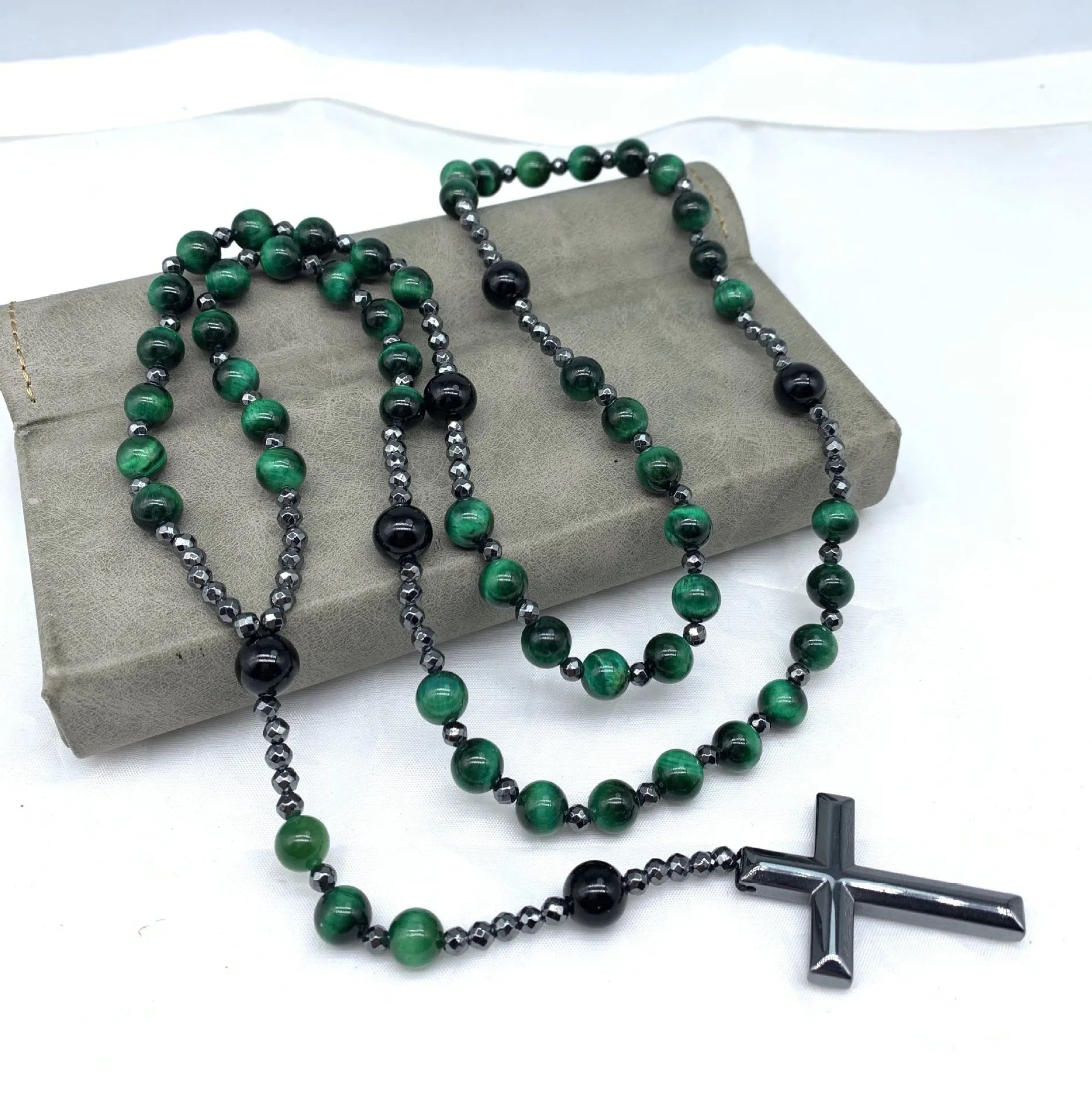 Men's stone geometric cross pendant on an 80cm ball bead chain with safety lock.