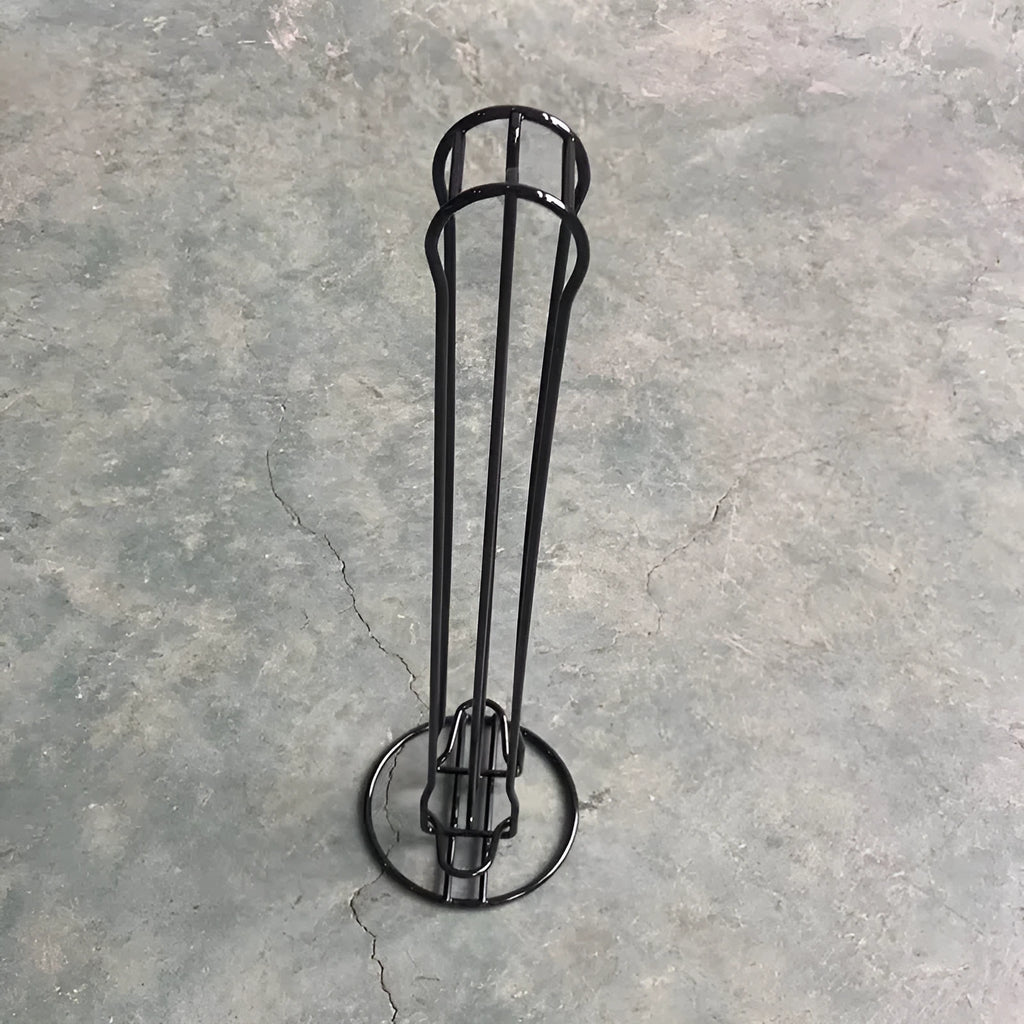 Wrought iron coffee capsule storage rack holding pods with black or silver finish