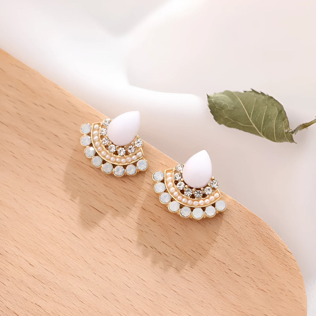 Women's retro fan-shaped alloy earrings with silver stud finish and opal rhinestone detail.