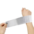 Breathable athletic wristguards in pink, black, and grey colours with elastic wrist support
