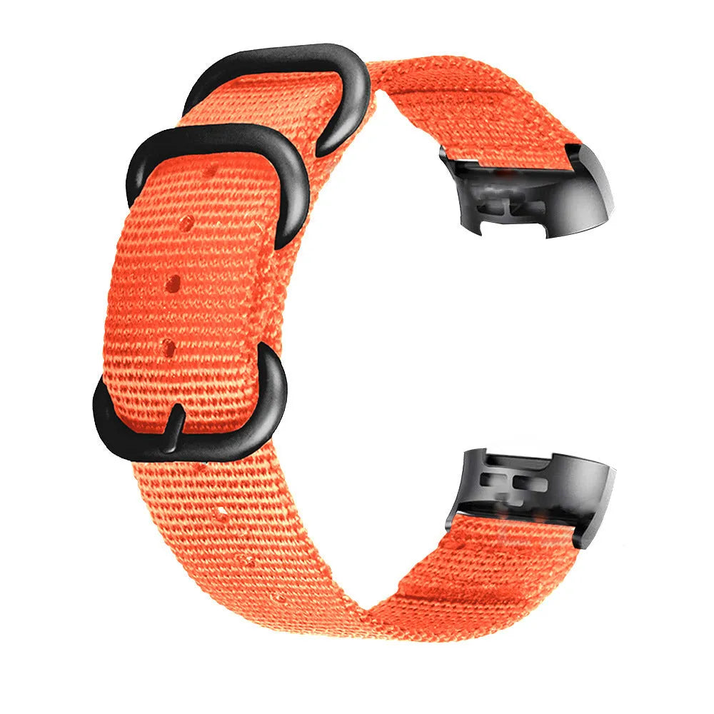 Nylon three-ring buckle replacement strap for Fitbit Charge 3 fitness tracker in multiple colours.