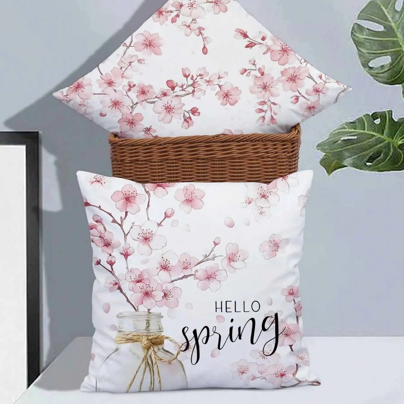 Short velvet cushion cover with cherry blossom and letter print in 45cm square size.