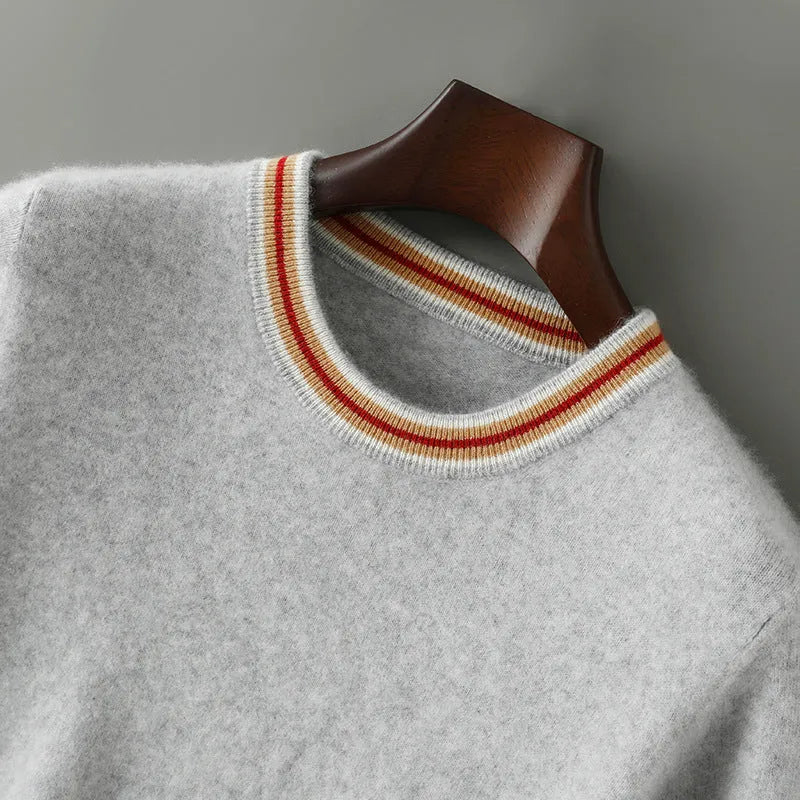 Men's grey short sleeve wool sweater with a round neck on a hanger.
