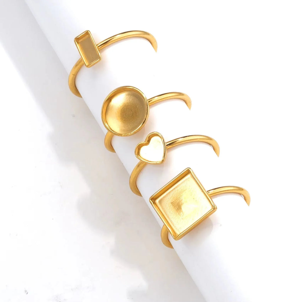 Golden electroplated stainless steel ring settings in various shapes and sizes with ring holder for DIY jewellery