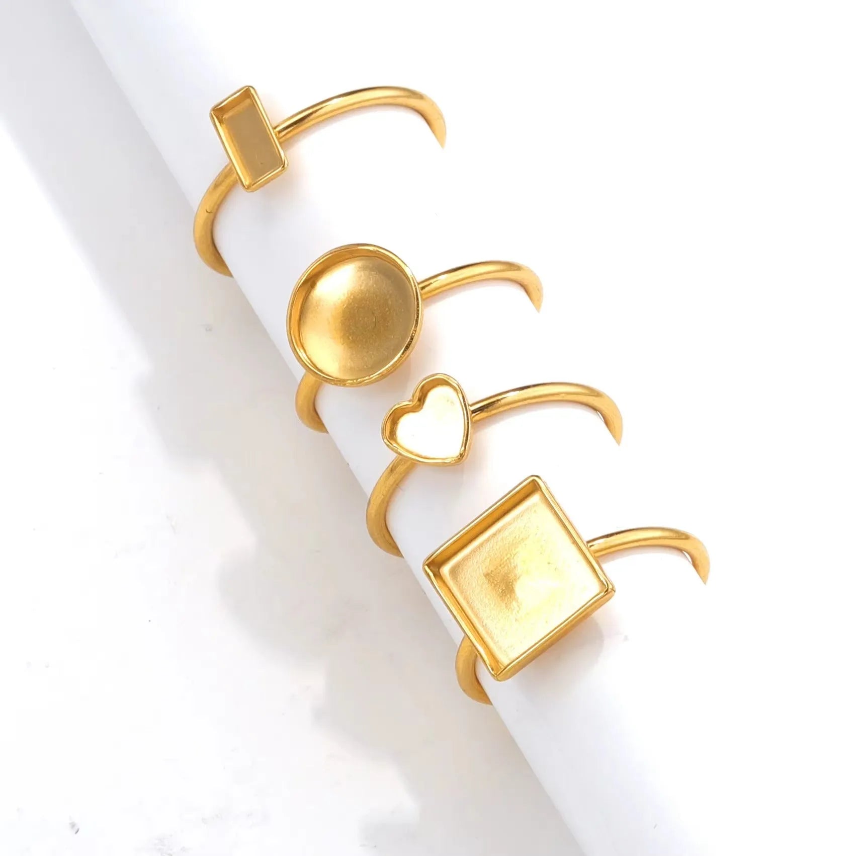Golden electroplated stainless steel ring settings in various shapes and sizes with ring holder for DIY jewellery