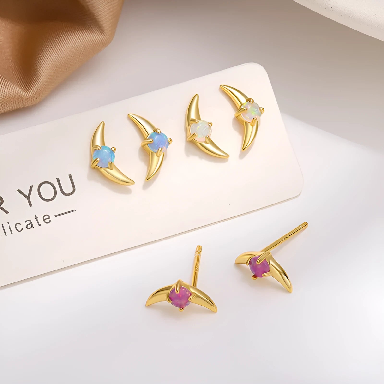 925 sterling silver geometric earrings with electroplated finish and stone accents in gold or platinum tone