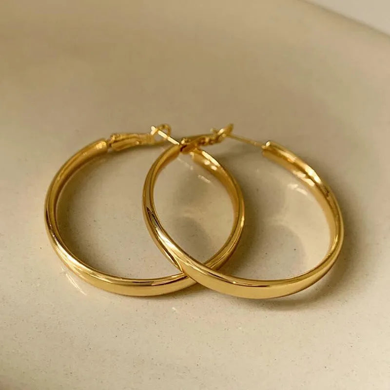 Gold and silver 40mm metal circle earrings with electroplated copper construction