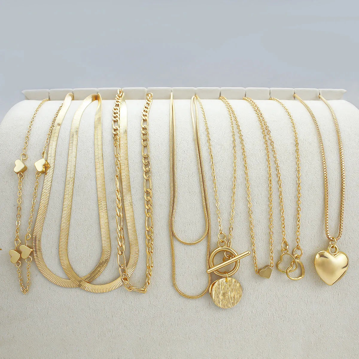 Gold colour women's necklace set with 10 alloy pendants on snake bone chain, adjustable 21-50cm