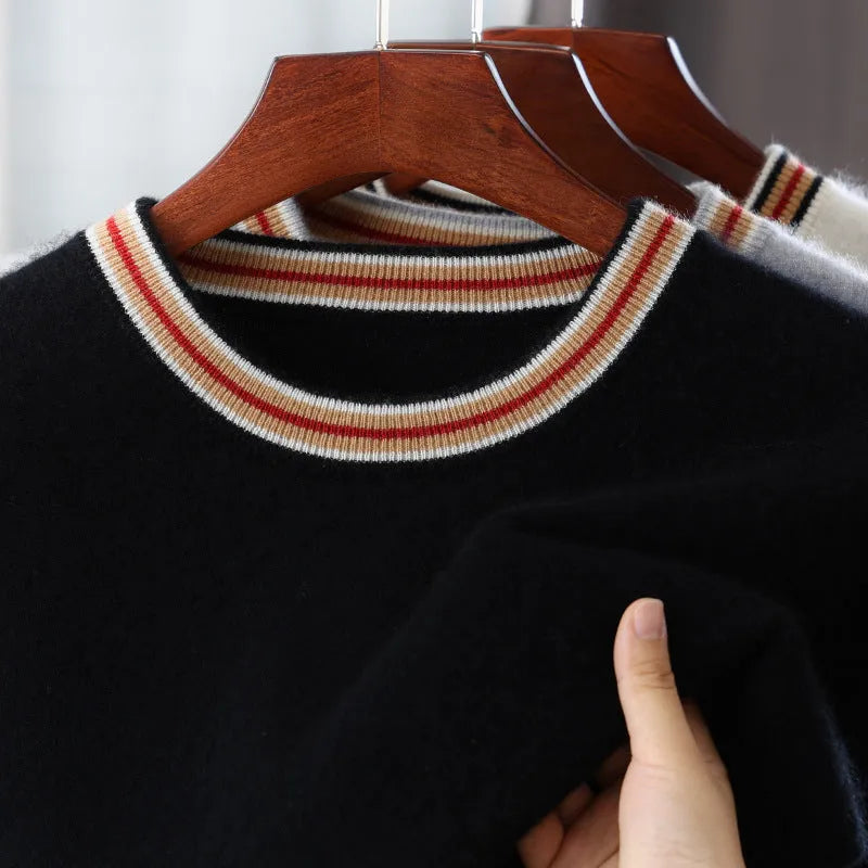 Men's grey short sleeve wool sweater with a round neck on a hanger.