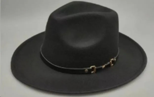 Brown leather velvet western cowboy hat with a curved brim and conical crown on a neutral background.