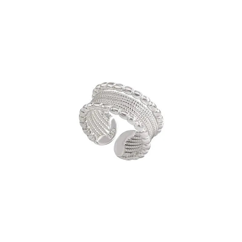 Copper alloy adjustable ring with geometric woven multilayer design