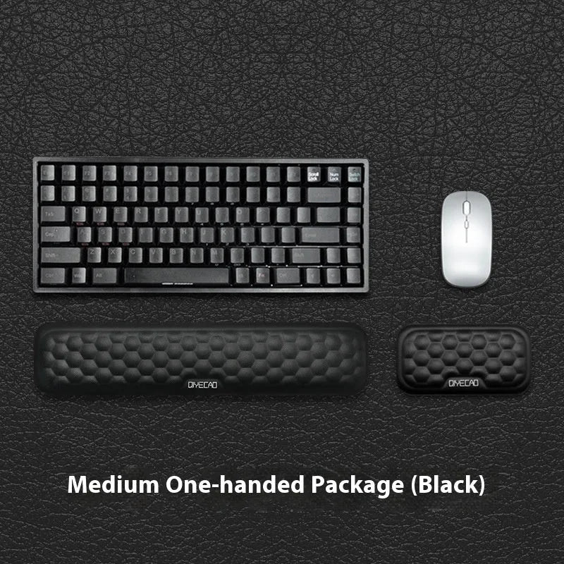 Memory foam mouse wrist rest pad with silicone base in black cloth cover option on desk
