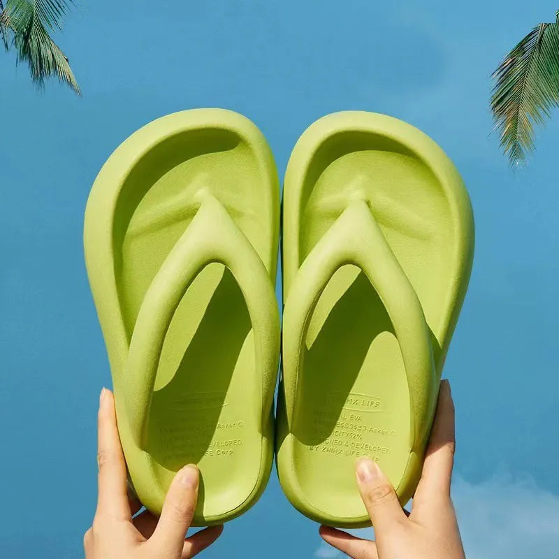 Women's thick-soled EVA flip-flops with a bow detail in assorted colours on a white background.