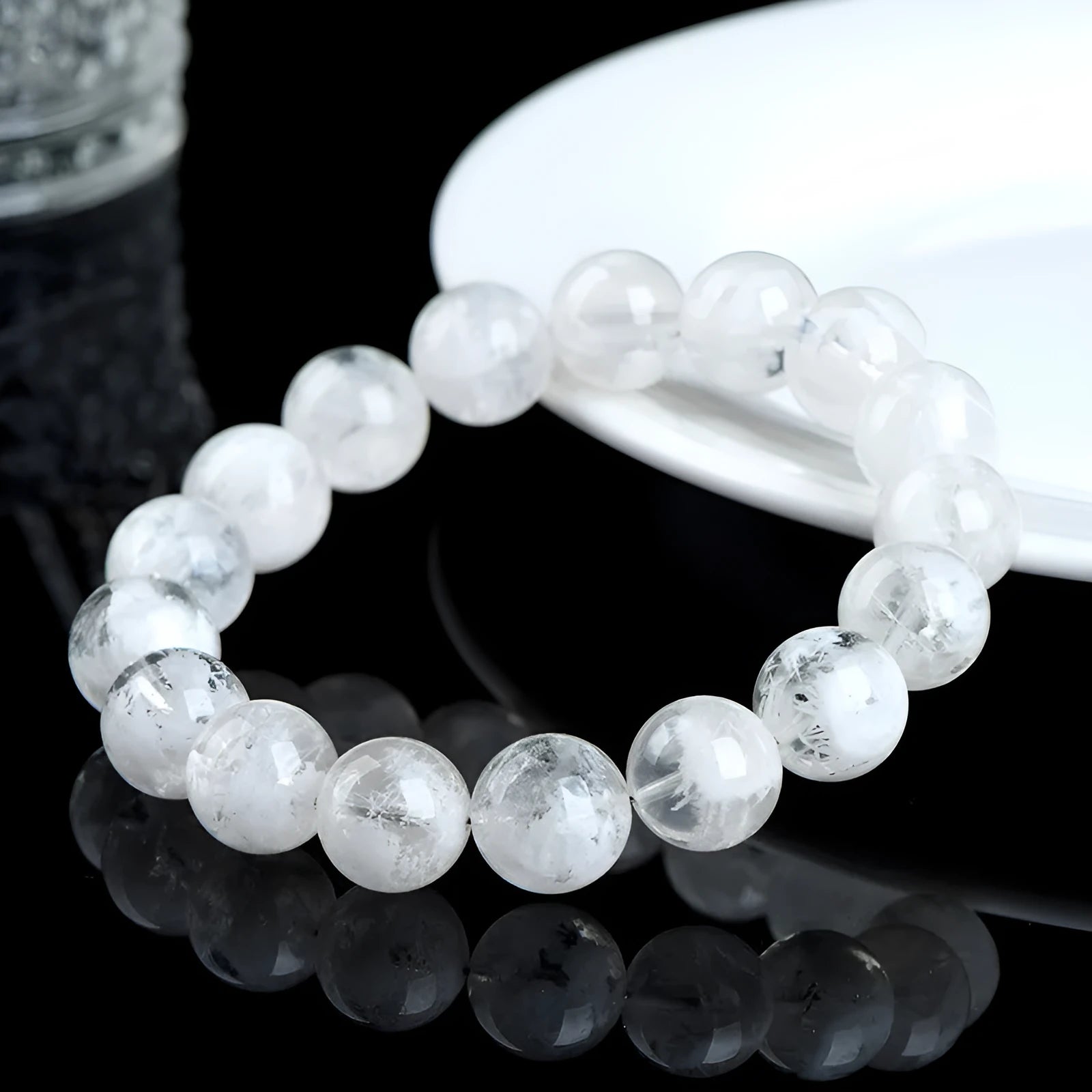 Women's natural blizzard snowflake round crystal bead bracelet with Ruyi and Xiangyun design.