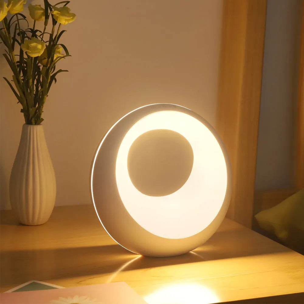 Creative Touch small RGB colour-changing desk night lamp with remote control on a wooden surface.