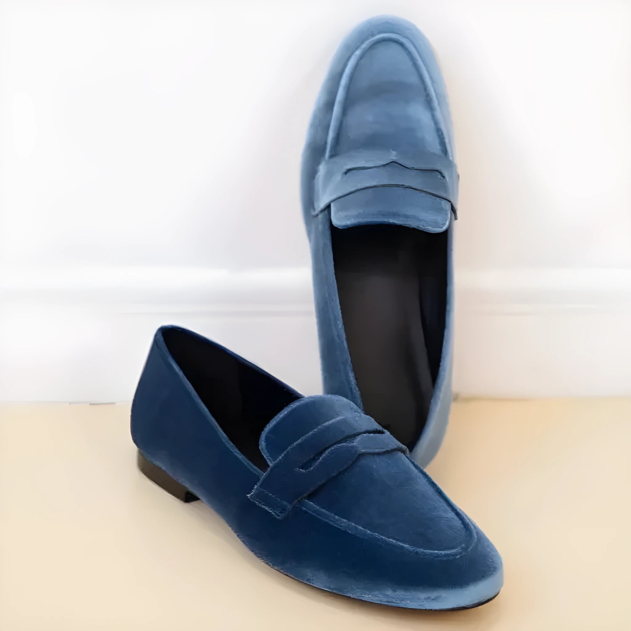 Blue leisure loafers with black rubber sole and round toe design