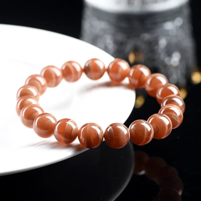 Natural old mine rhodochrosite round bead bracelet with geometric design and ruyi elements
