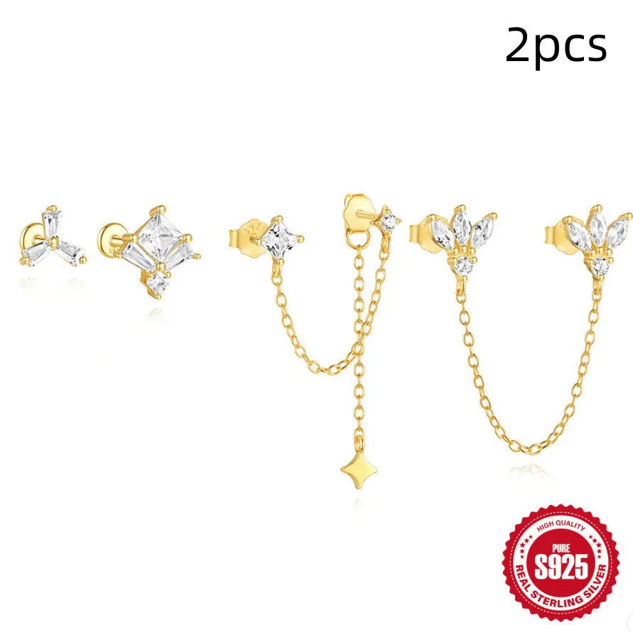 Golden geometric sterling silver earrings with zircon details for double piercings
