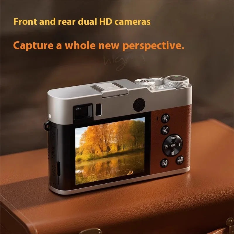Black and brown 5K HD digital camera with dual lenses and an optical viewfinder on the body.