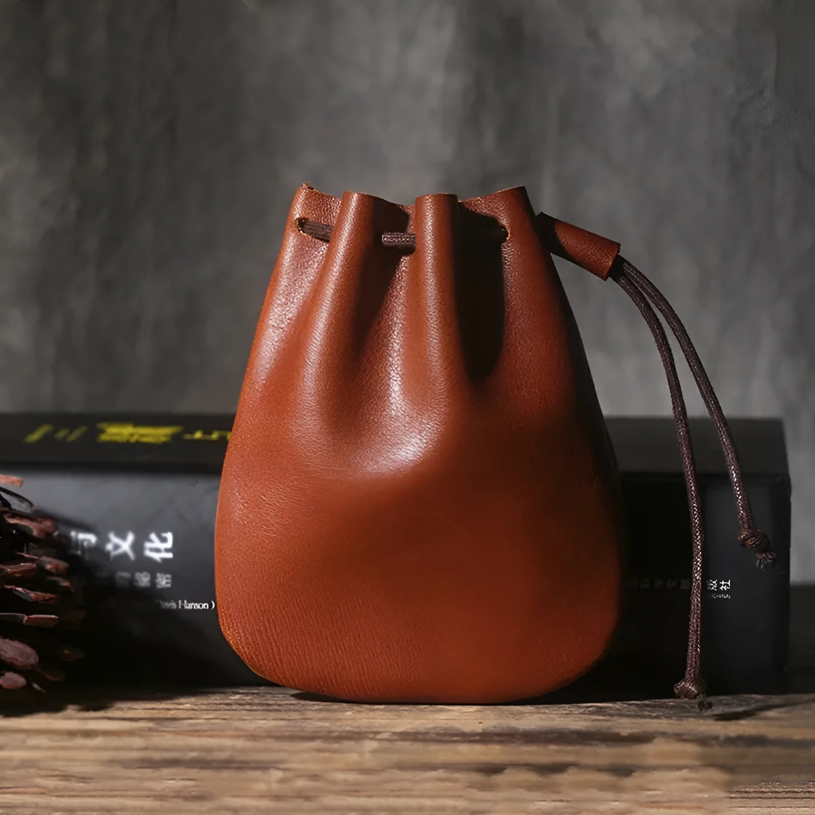 Vintage cowhide drawstring bundle wallet in genuine leather with sewing thread detail