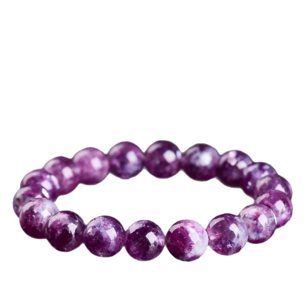 Grandmother Crystal bracelet with purple geometry-shaped beads on a wrist.