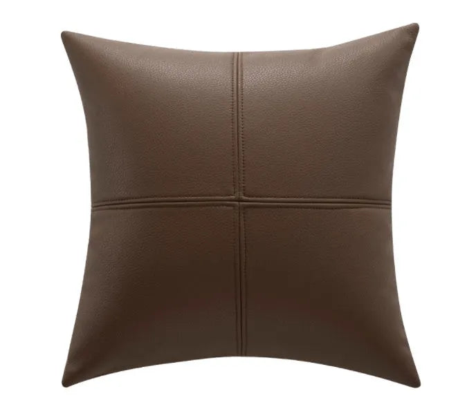 Solid colour soft cowhide leather pillow cover in Nordic style on a grey sofa.