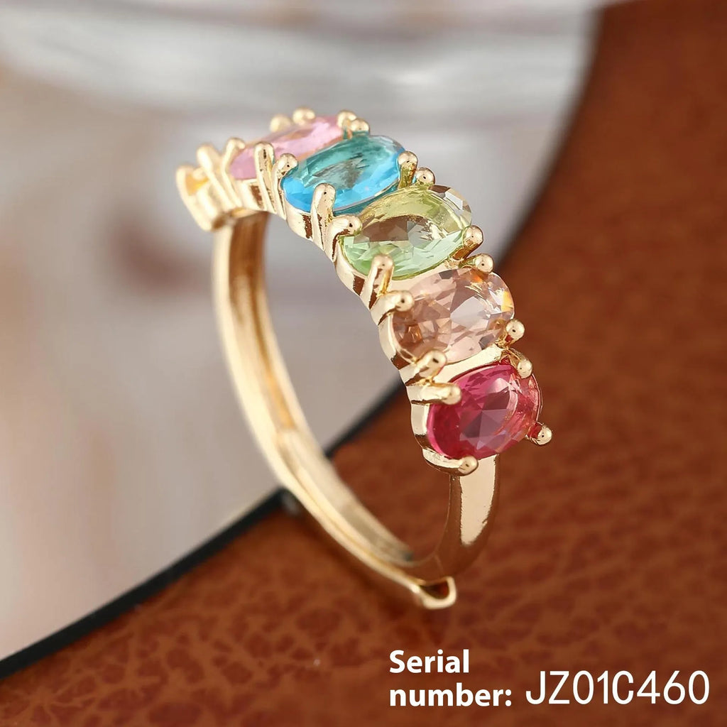 Gold-colour adjustable women's ring with zircon detail on copper base