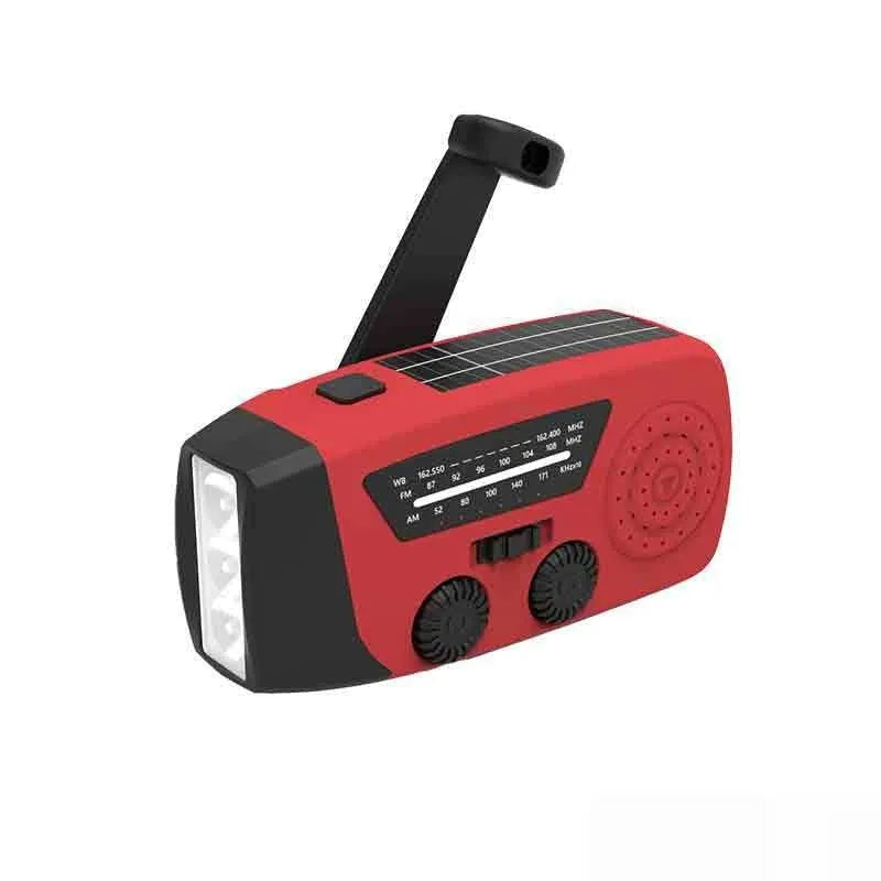 Red rechargeable emergency hand radio torch with AM/FM radio, LED light, and USB power bank functionality