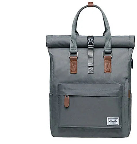 Casual black polyester backpack showing interior computer pocket and under 20-litre capacity