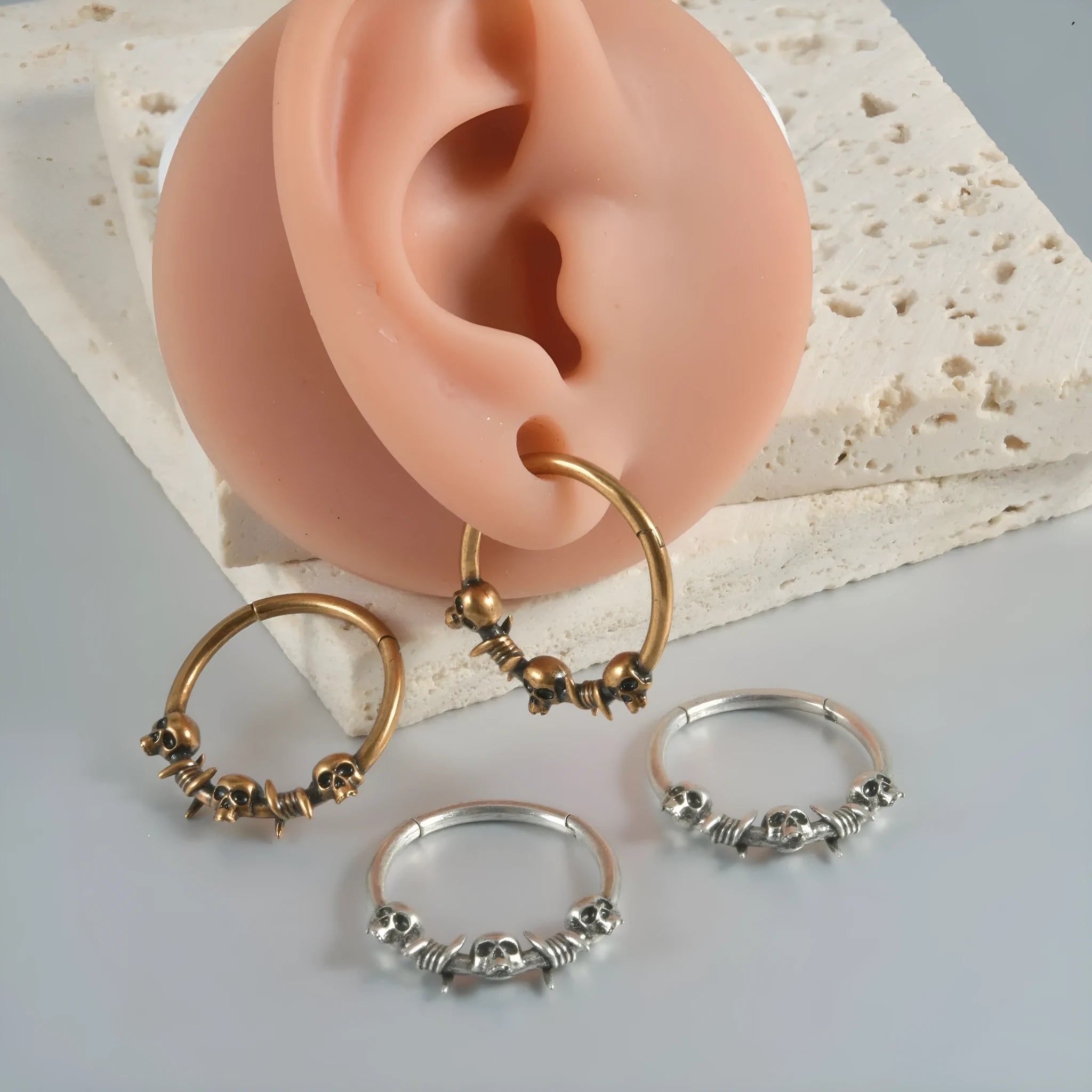 Copper punk earrings with ghost head designs in antique silver or ancient gold finish