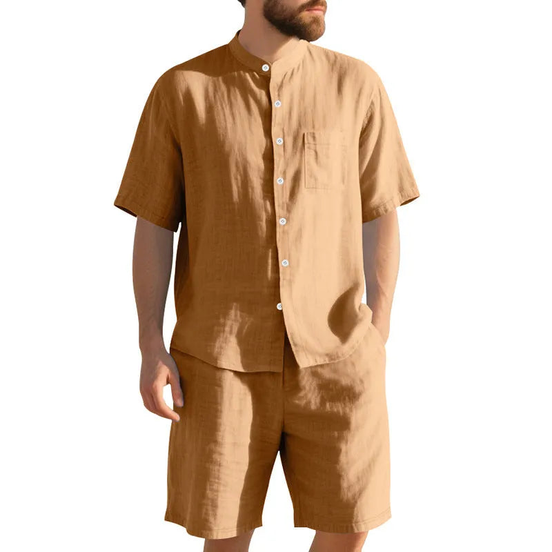 Men's light blue linen-blend summer suit with short sleeve shirt jacket and matching shorts on a hanger.