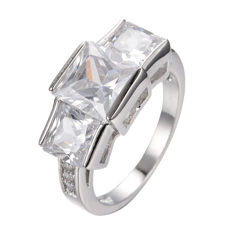 Geometric copper women's ring with an electroplated finish shown in multiple colour options on a white background.