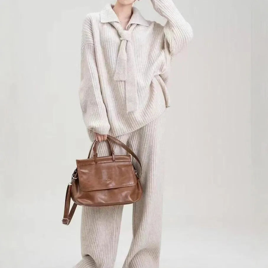 Women's knitted sweater suit two-piece set with top and trousers in neutral colours