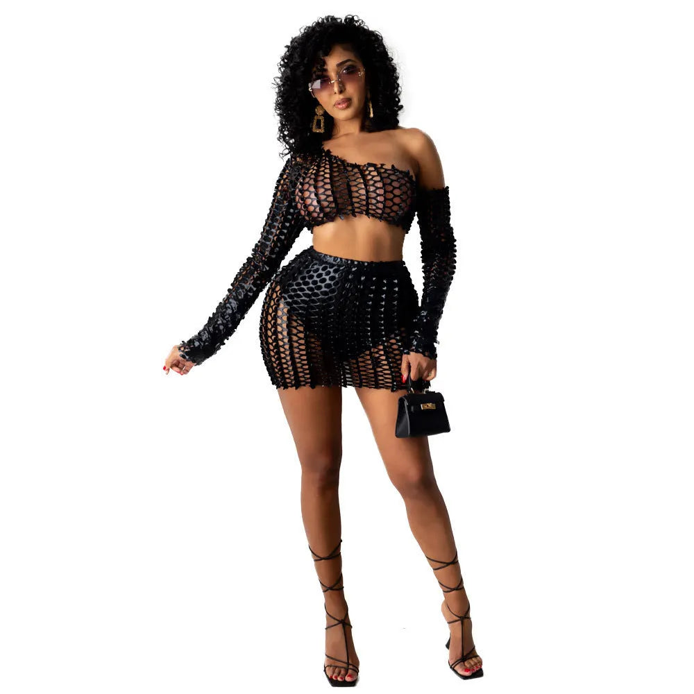 Women's black two-piece dress set with net hole hollow-out design on sleeveless top and short skirt