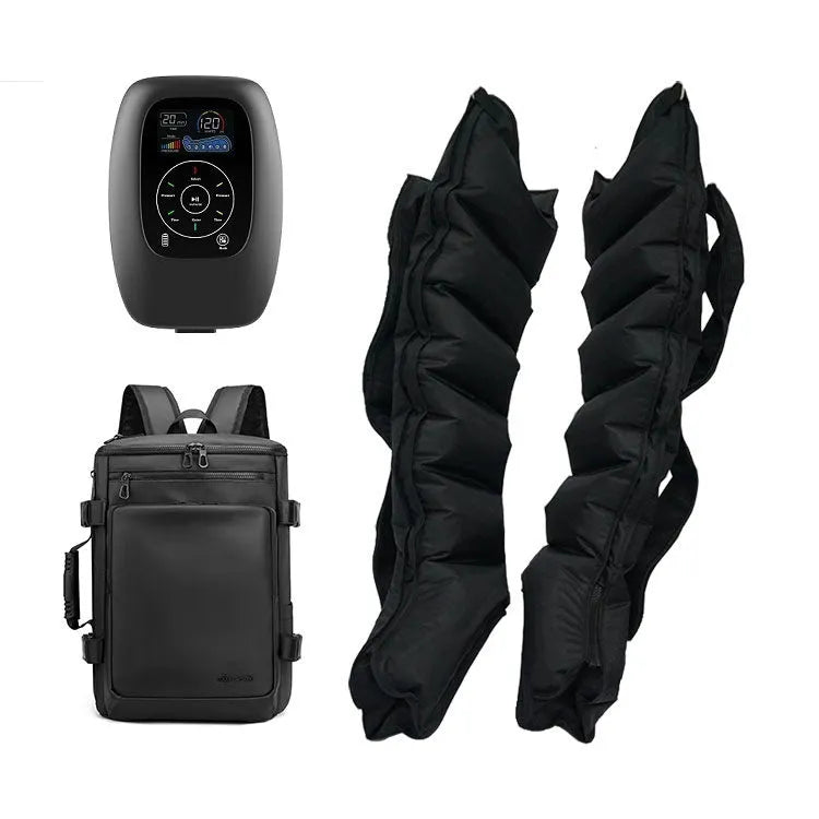 Air wave pressure massager set with remote control, leg sleeves, arm sleeve, and waist belt on a table.