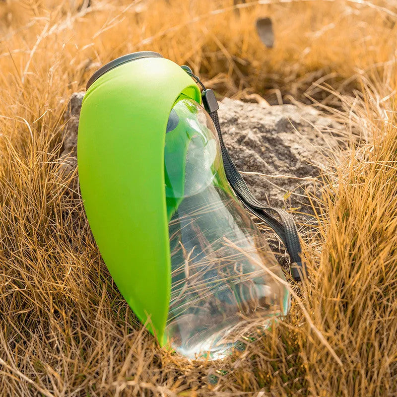 Blue portable dog water bottle with attached wide drinking bowl, showing key lock mechanism
