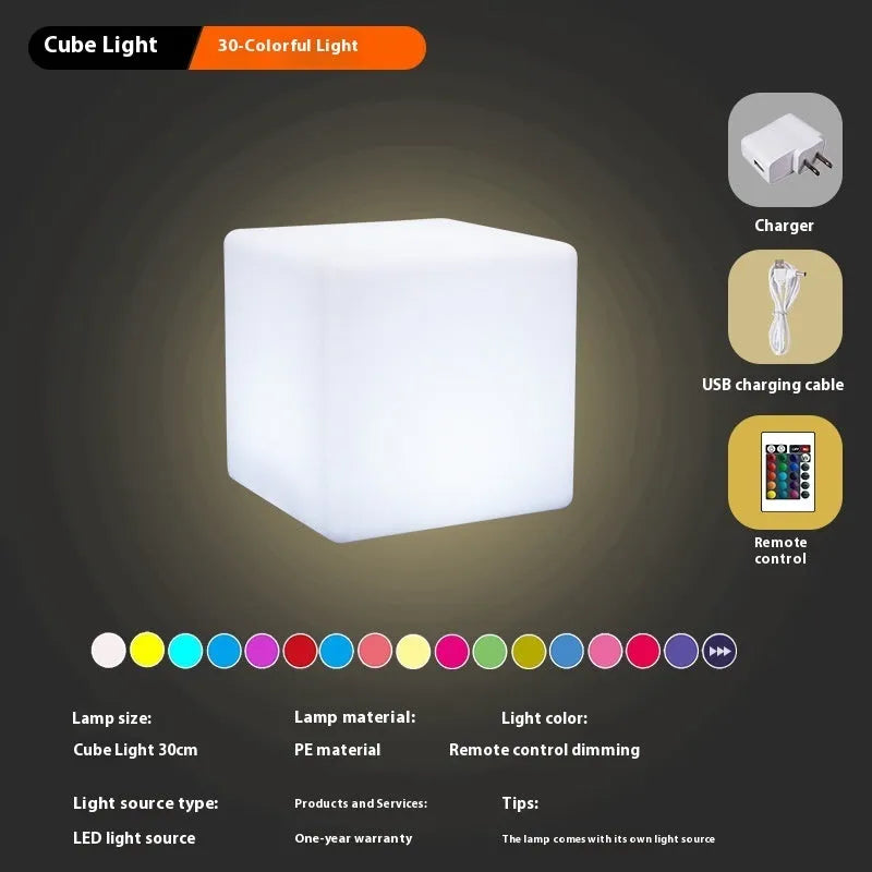Modern white LED square cube light for outdoor garden and pathway illumination.