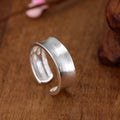 Geometric open sterling silver ring with frosted finish and adjustable opening