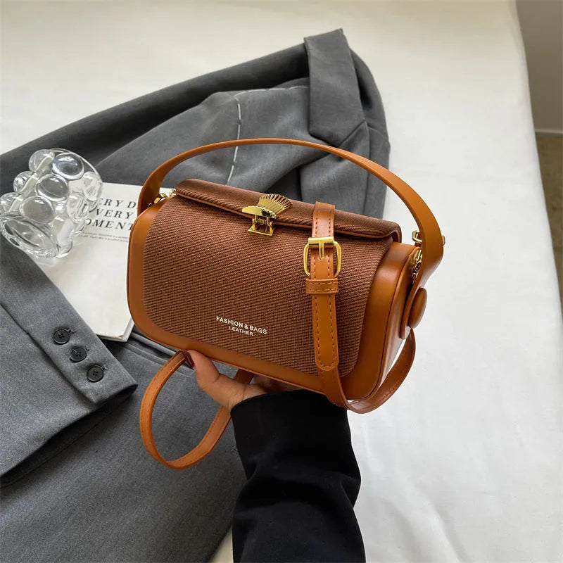 Women's black PU messenger bag with horizontal square shape and crossbody strap