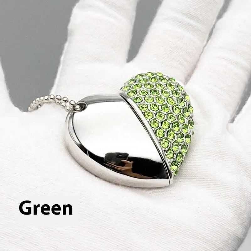 Blue heart-shaped metal USB flash drive with a brick pattern design on a white background.