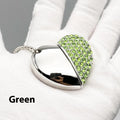 Blue heart-shaped metal USB flash drive with a brick pattern design on a white background.